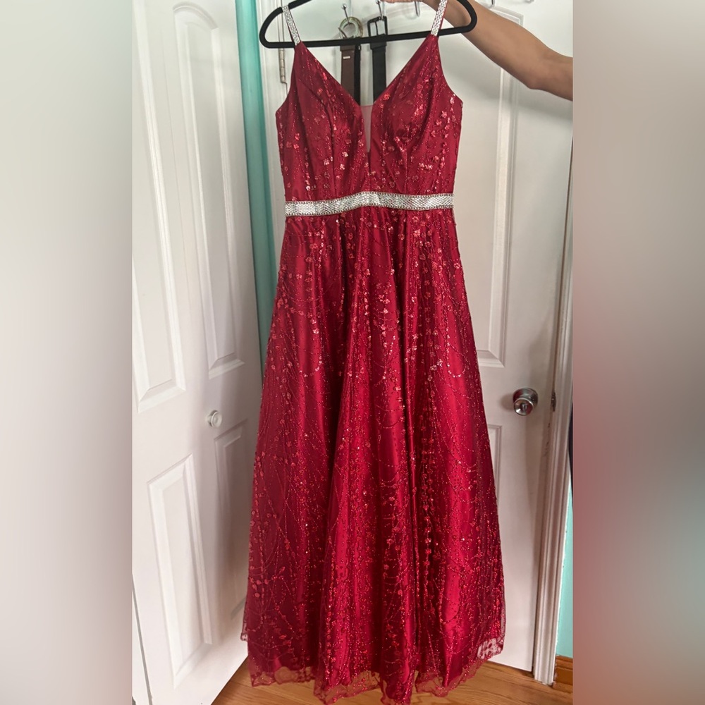 Red sequins Prom dress with sliver diamond waist band and straps.
